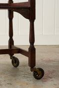 Load image into Gallery viewer, Antique English Oak Two-Tier Barley Twist Trolley On Casters