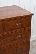Load image into Gallery viewer, Thin English Mahogany Chest with Original Wooden Knobs + Feet (c. 1825)