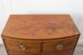Load image into Gallery viewer, 19th Century Mahogany Bowfront Chest with Satinwood Inlay on Splay Feet (c. 1810)