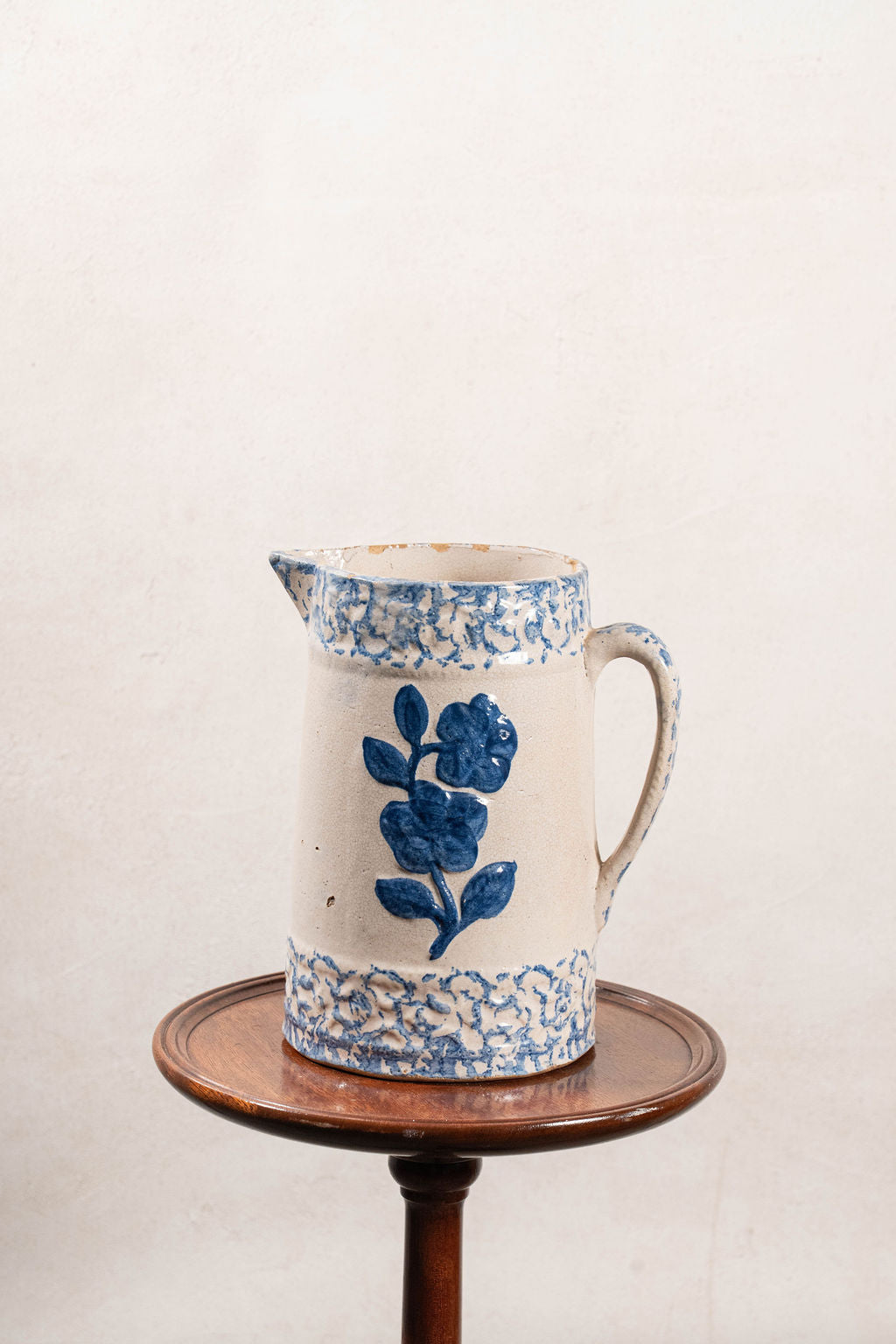 19th Century Blue + White Stoneware Spongeware Pitcher with Wild Rose Glaze