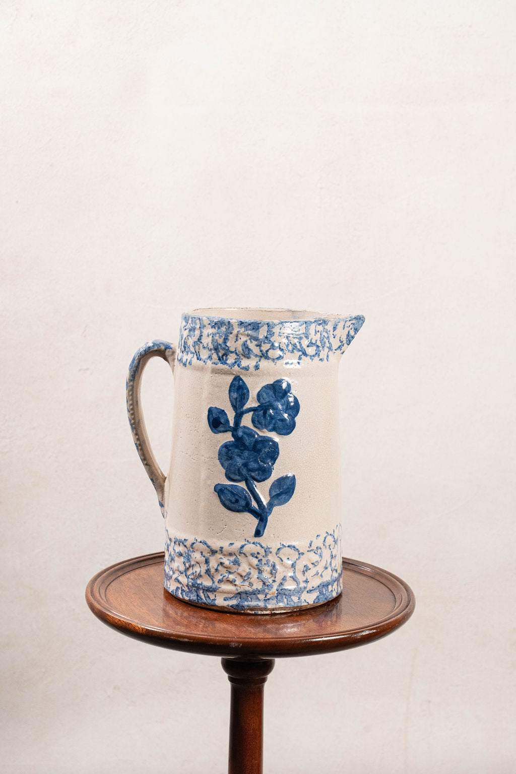 19th Century Blue + White Stoneware Spongeware Pitcher with Wild Rose Glaze