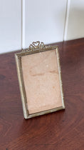Load image into Gallery viewer, PAIR Antique French Brass Tabletop Frames with Top Bow Detailing
