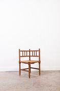 Load image into Gallery viewer, Antique Bobbin Rush Seat Corner Chair
