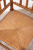 Load image into Gallery viewer, Antique Bobbin Rush Seat Corner Chair
