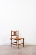 Load image into Gallery viewer, Antique Bobbin Rush Seat Corner Chair
