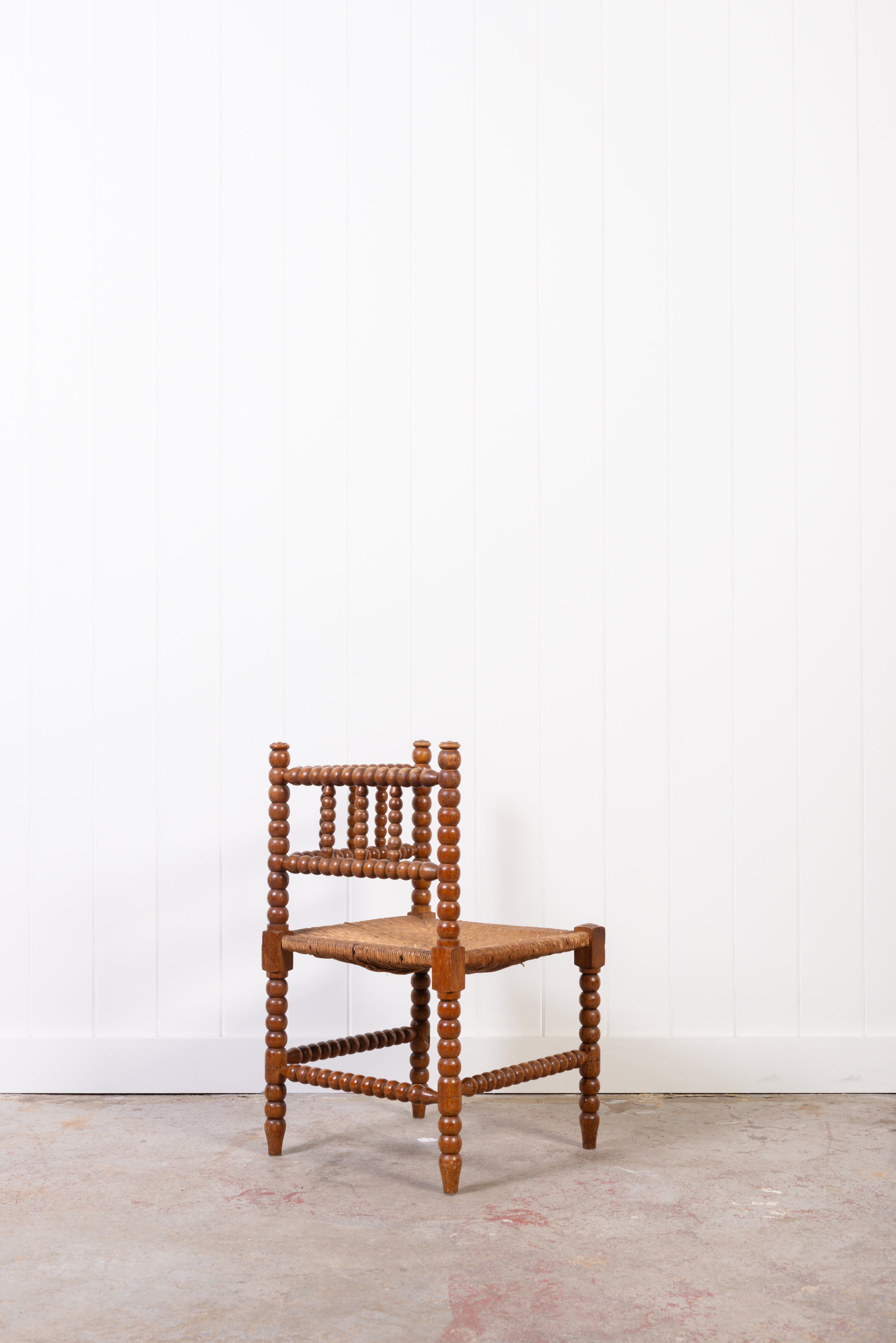 Antique Bobbin Rush Seat Corner Chair