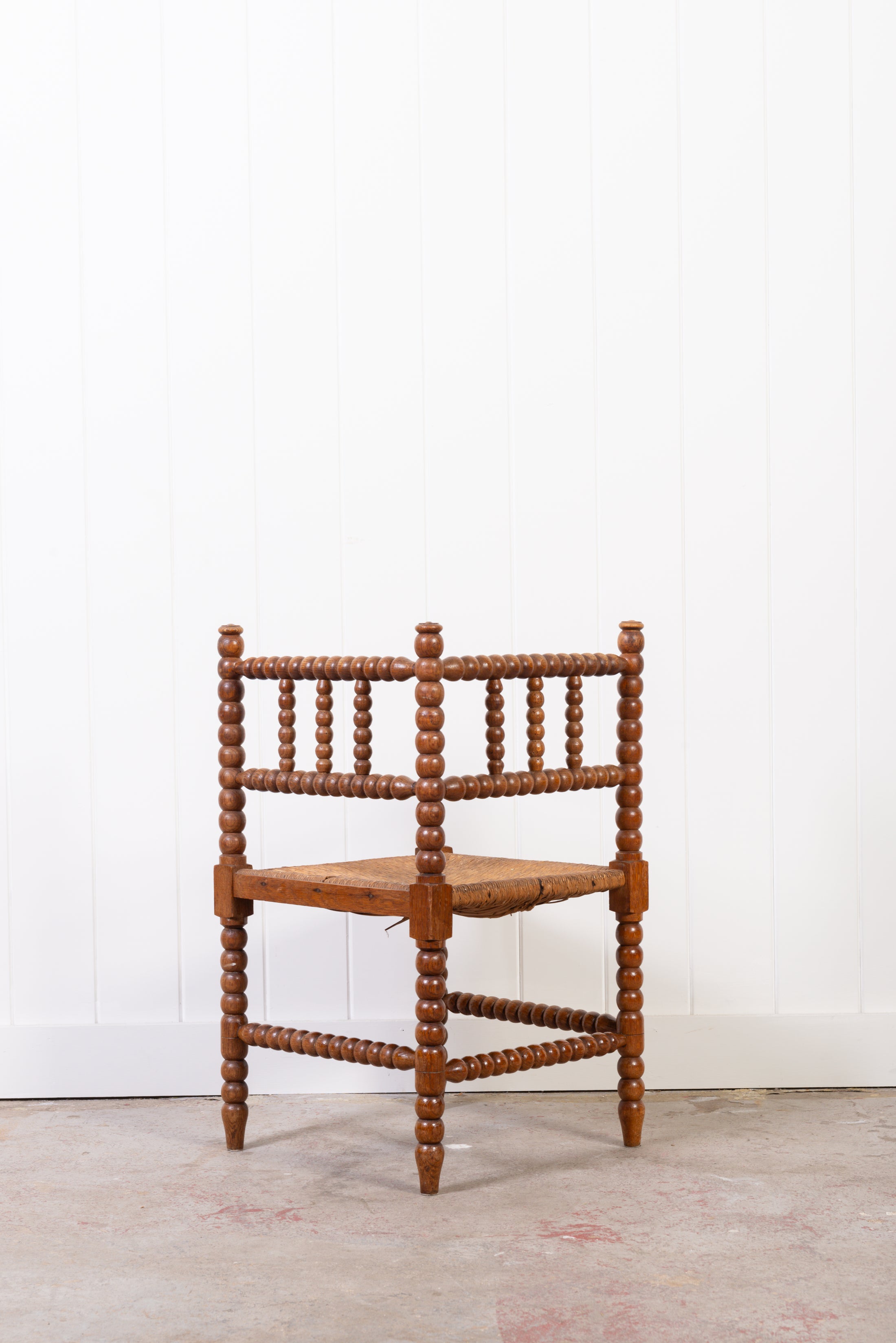 Antique Bobbin Rush Seat Corner Chair