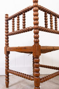 Load image into Gallery viewer, Antique Bobbin Rush Seat Corner Chair
