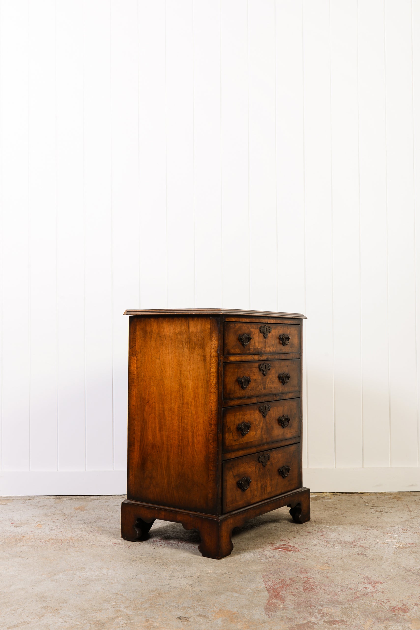 English Book-Match Walnut Four Drawer Bachelor's Chest