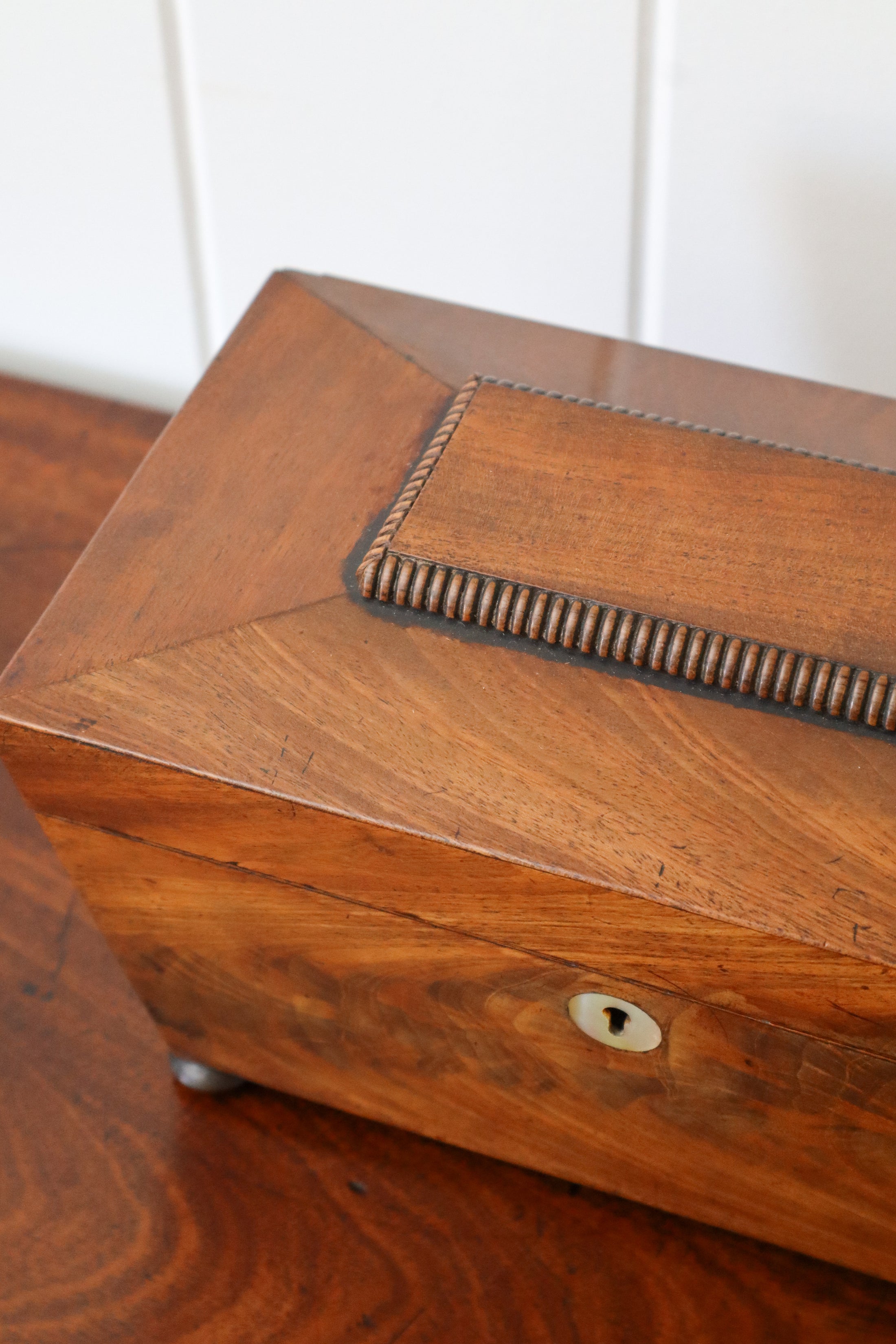 19th Century Mahogany Tea Caddy with Carved Top Detail on Bun Feet