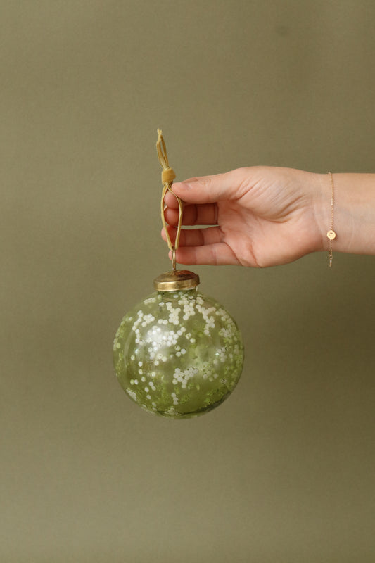 Green Glass Ball Ornament with Cream Pattern