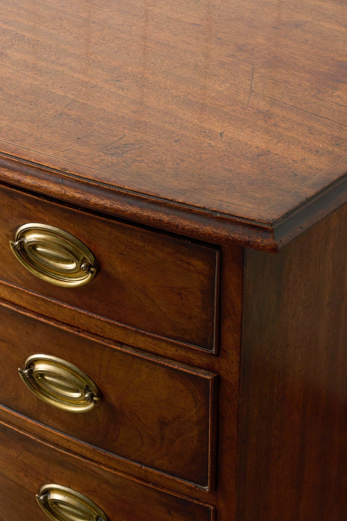 19th Century English Walnut Bow Front 4-Drawer Chest on Bracket Feet