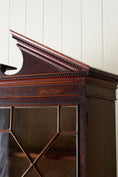 Load image into Gallery viewer, George III Mahogany Glass front Bookcase With Brushing Slide And Greek Key Pediment
