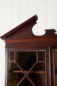 Load image into Gallery viewer, George III Mahogany Glass front Bookcase With Brushing Slide And Greek Key Pediment
