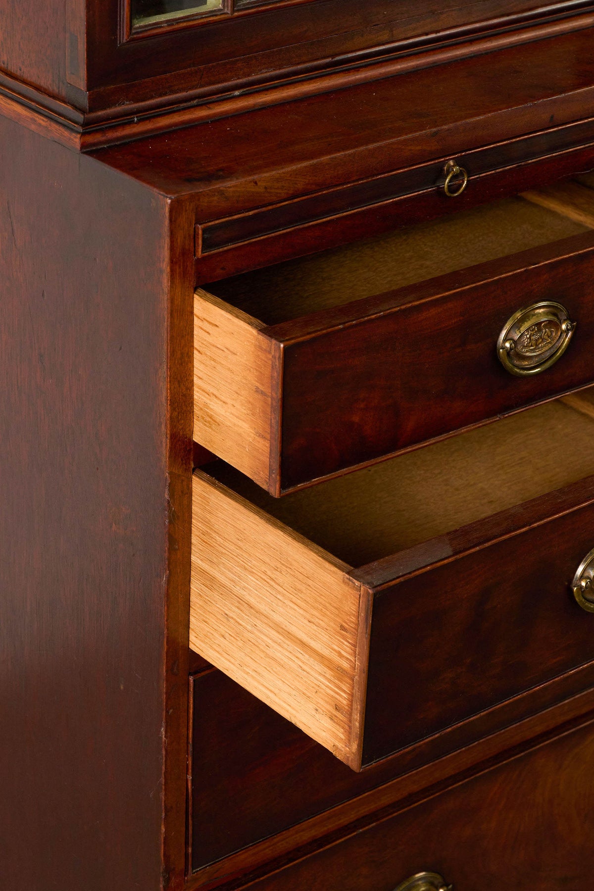 George III Mahogany Glass front Bookcase With Brushing Slide And Greek Key Pediment