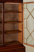 Load image into Gallery viewer, George III Mahogany Glass front Bookcase With Brushing Slide And Greek Key Pediment
