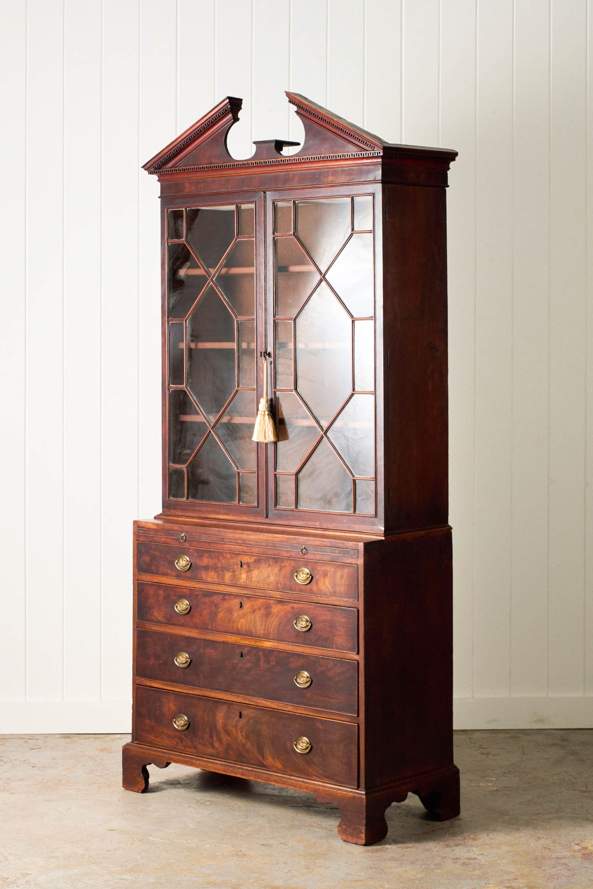 George III Mahogany Glass front Bookcase With Brushing Slide And Greek Key Pediment