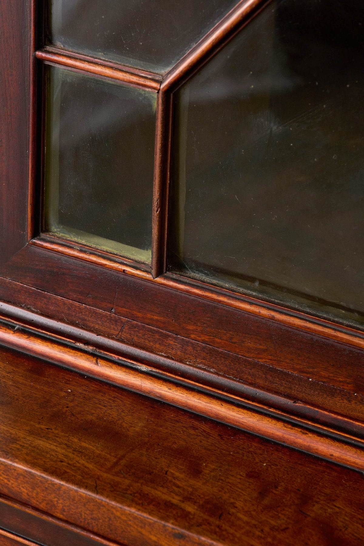 George III Mahogany Glass front Bookcase With Brushing Slide And Greek Key Pediment