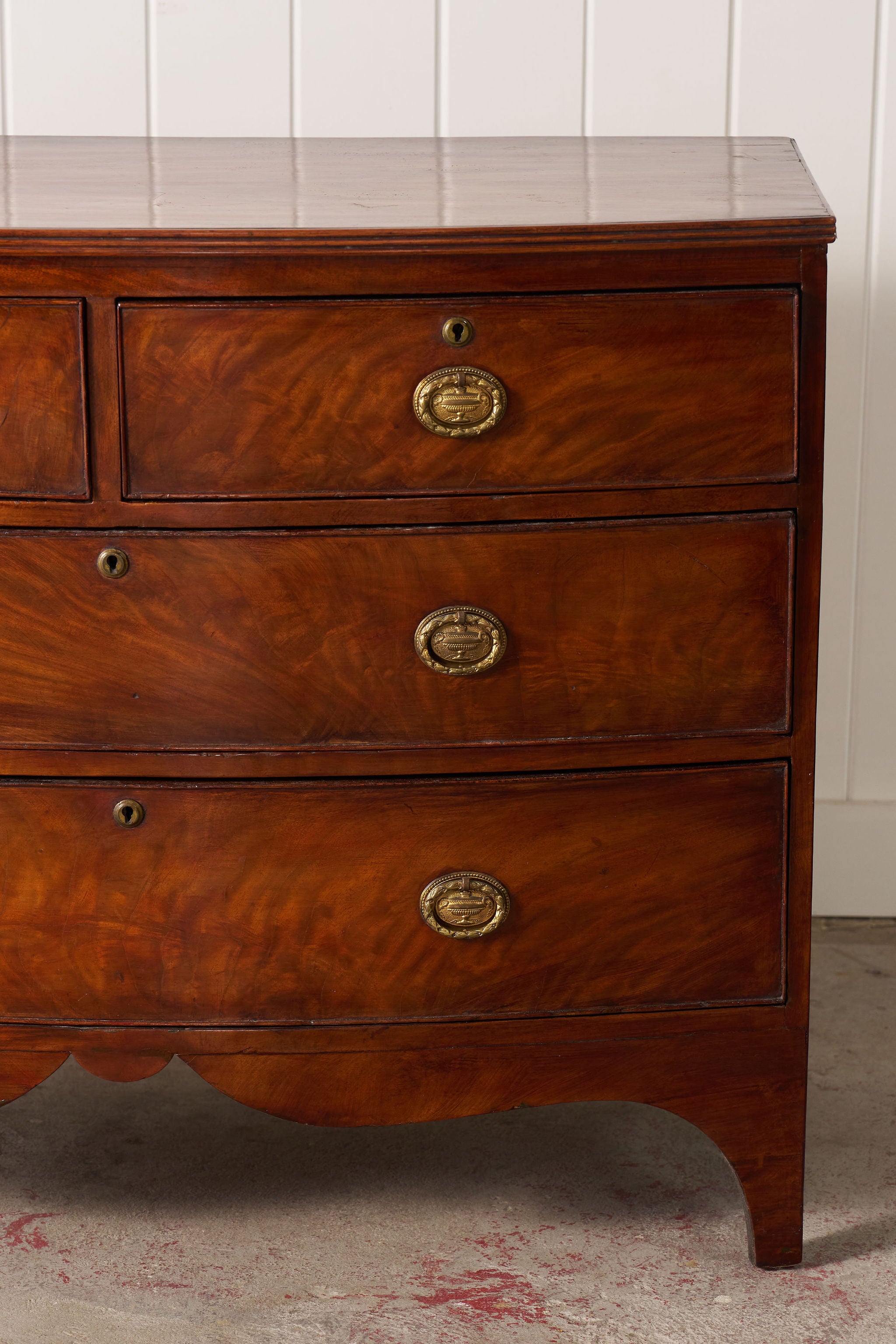 19th Century Victorian Flame Mahogany Bowfront Chest With Urn Hardware