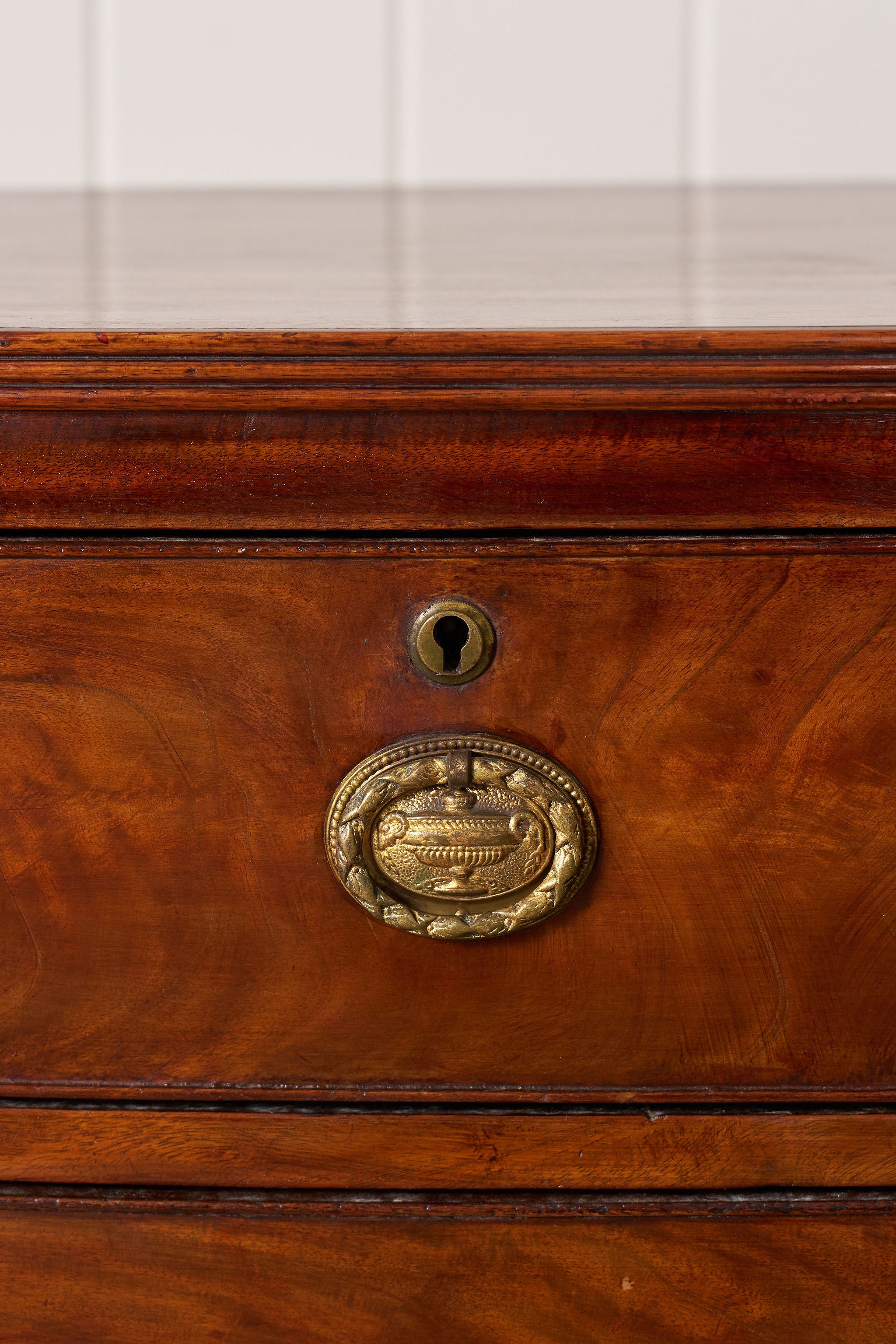 19th Century Victorian Flame Mahogany Bowfront Chest With Urn Hardware