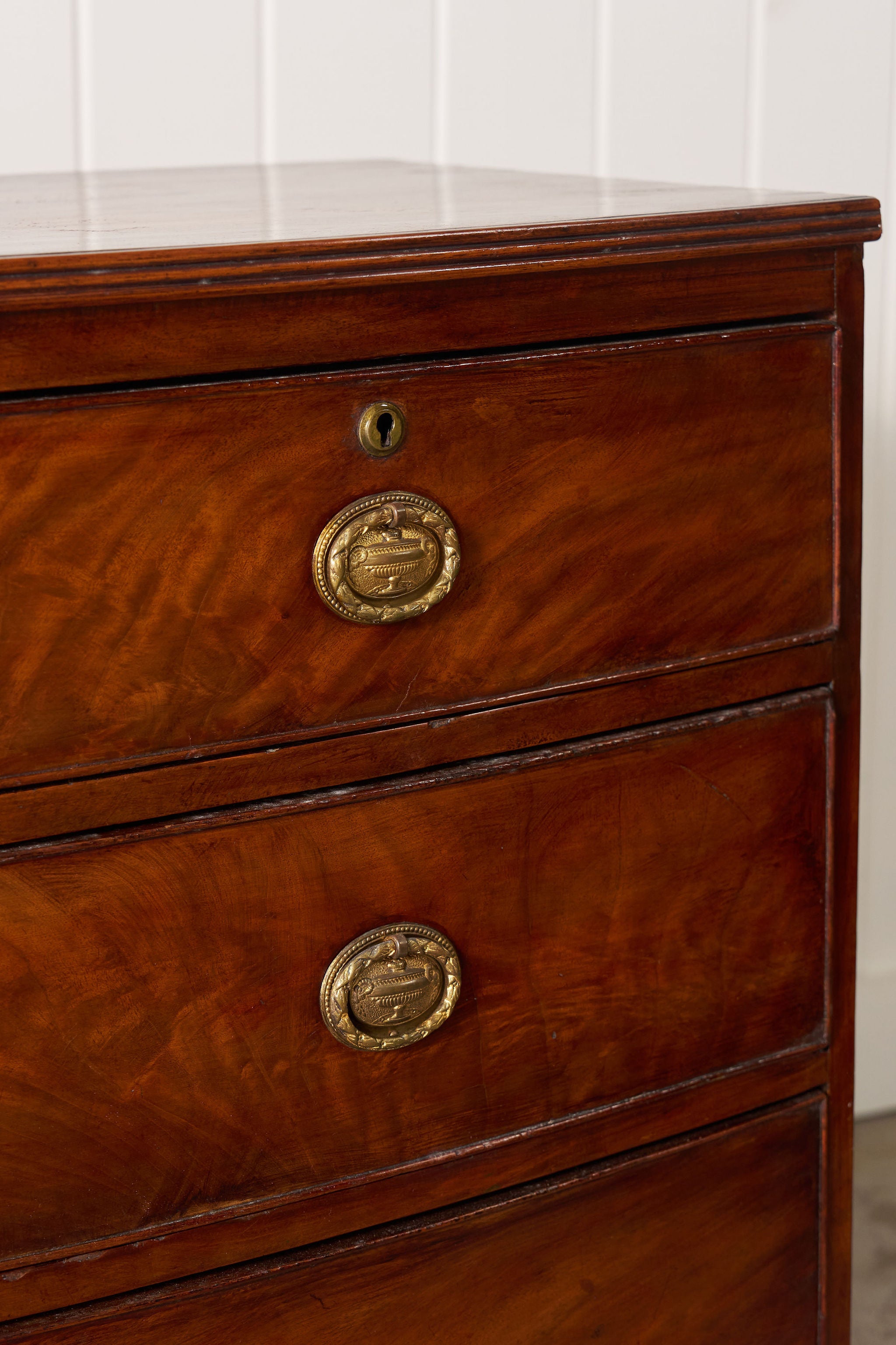 19th Century Victorian Flame Mahogany Bowfront Chest With Urn Hardware
