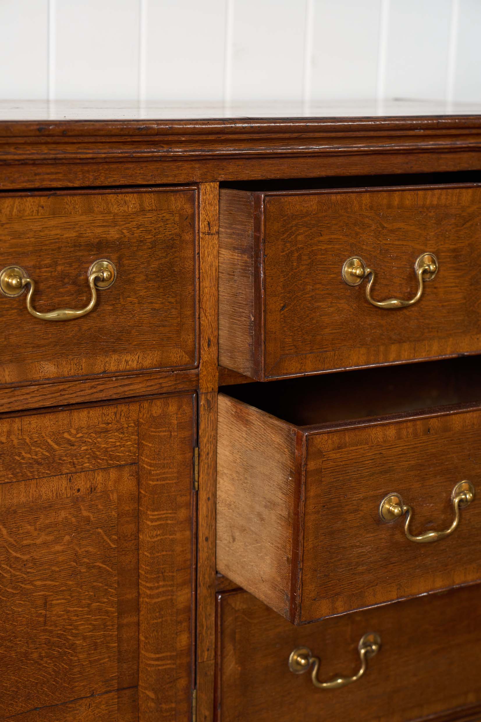 Exquisite Late Georgian Period Oak + Mahogany Banded Dresser Base (c. 1780) with Original Swan Handles