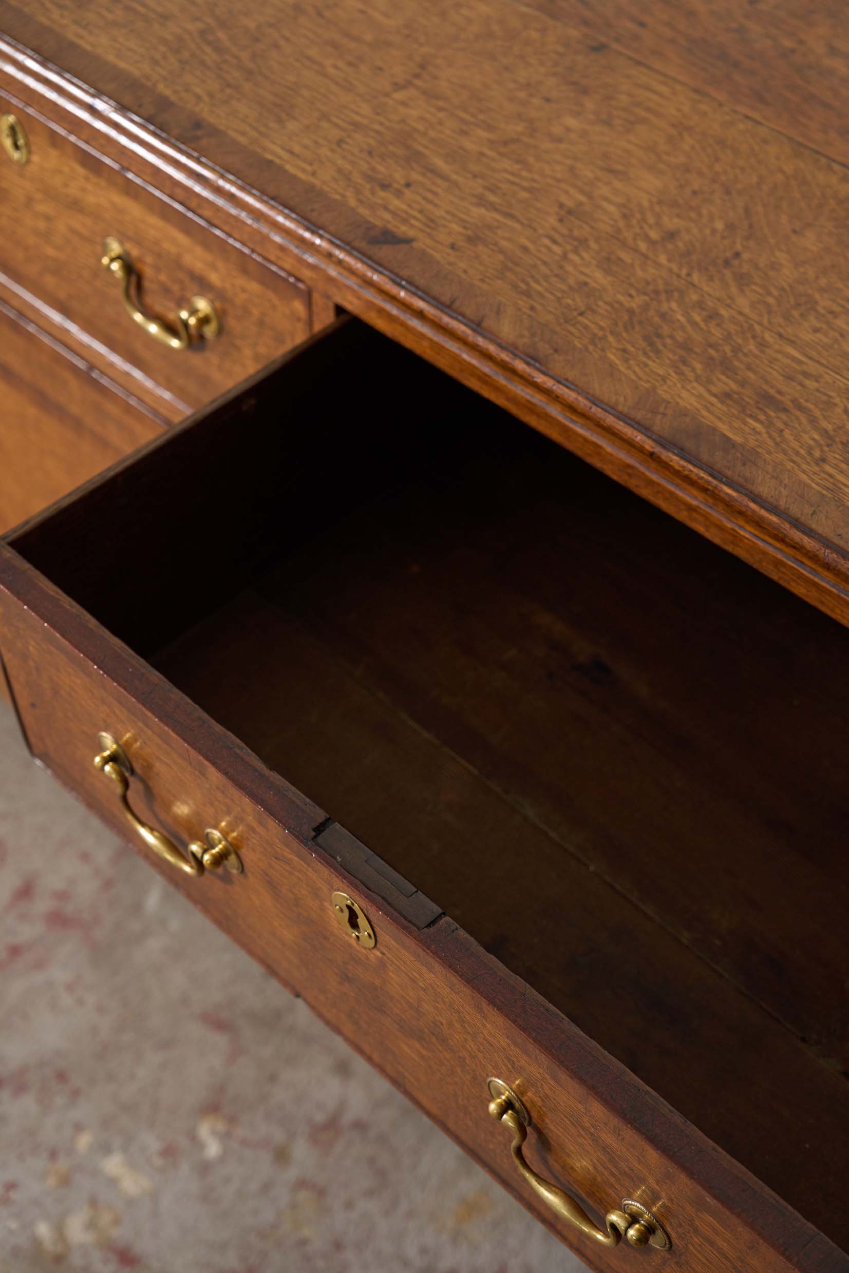 Exquisite Late Georgian Period Oak + Mahogany Banded Dresser Base (c. 1780) with Original Swan Handles