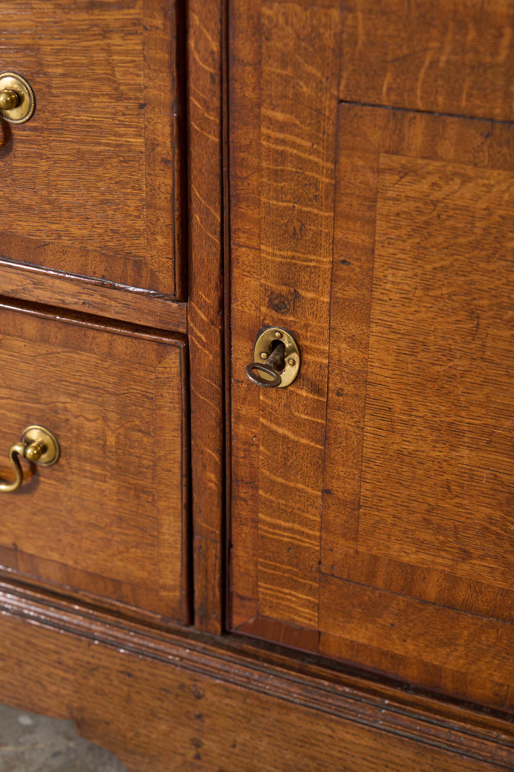 Exquisite Late Georgian Period Oak + Mahogany Banded Dresser Base (c. 1780) with Original Swan Handles