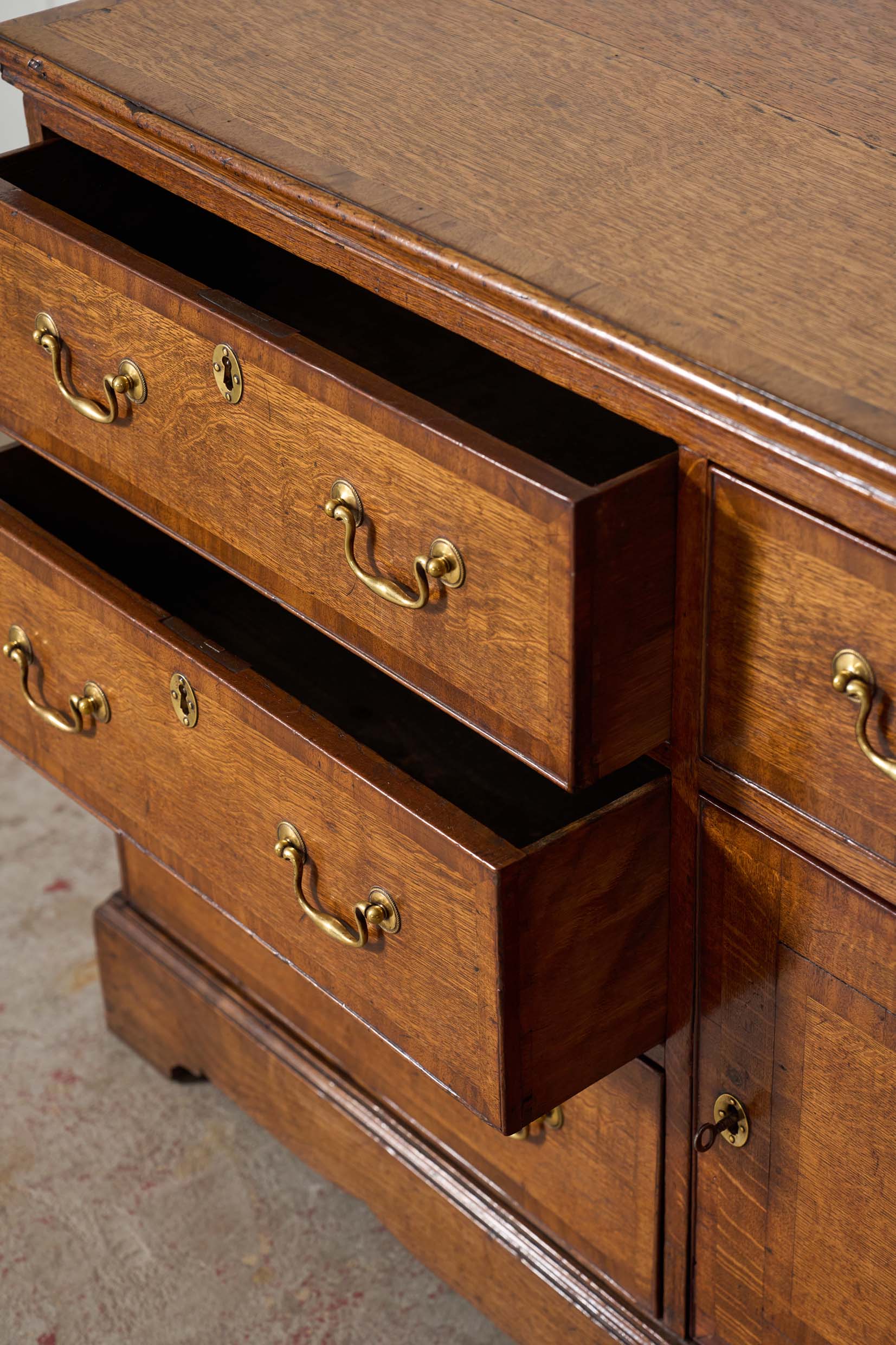Exquisite Late Georgian Period Oak + Mahogany Banded Dresser Base (c. 1780) with Original Swan Handles