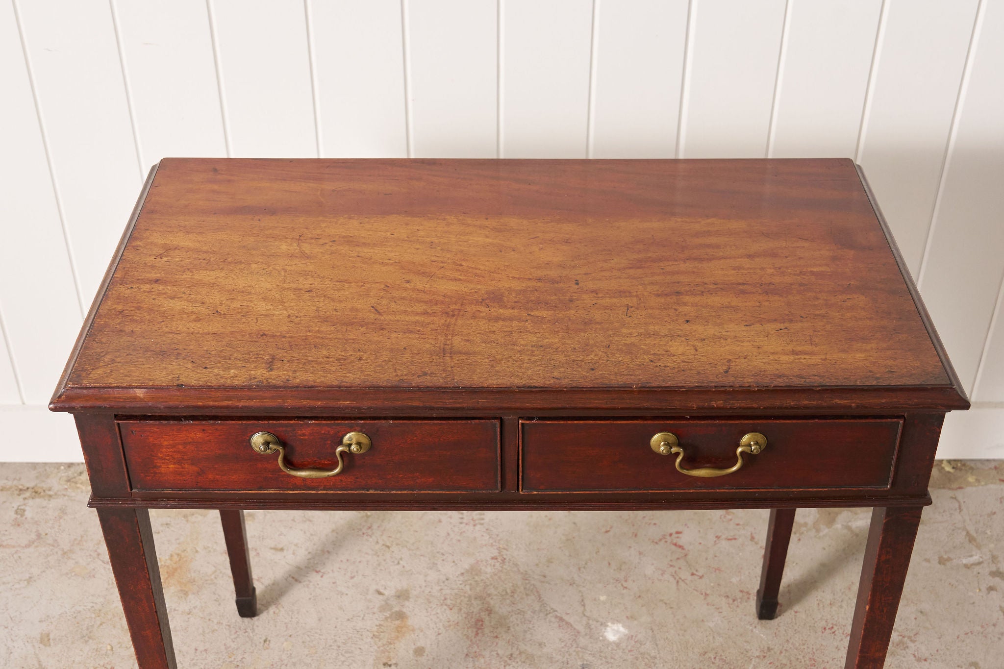 18th Century Georgian Mahogany Two Drawer Desk With Square Tapered Legs and Spade Feet (c. 1790)