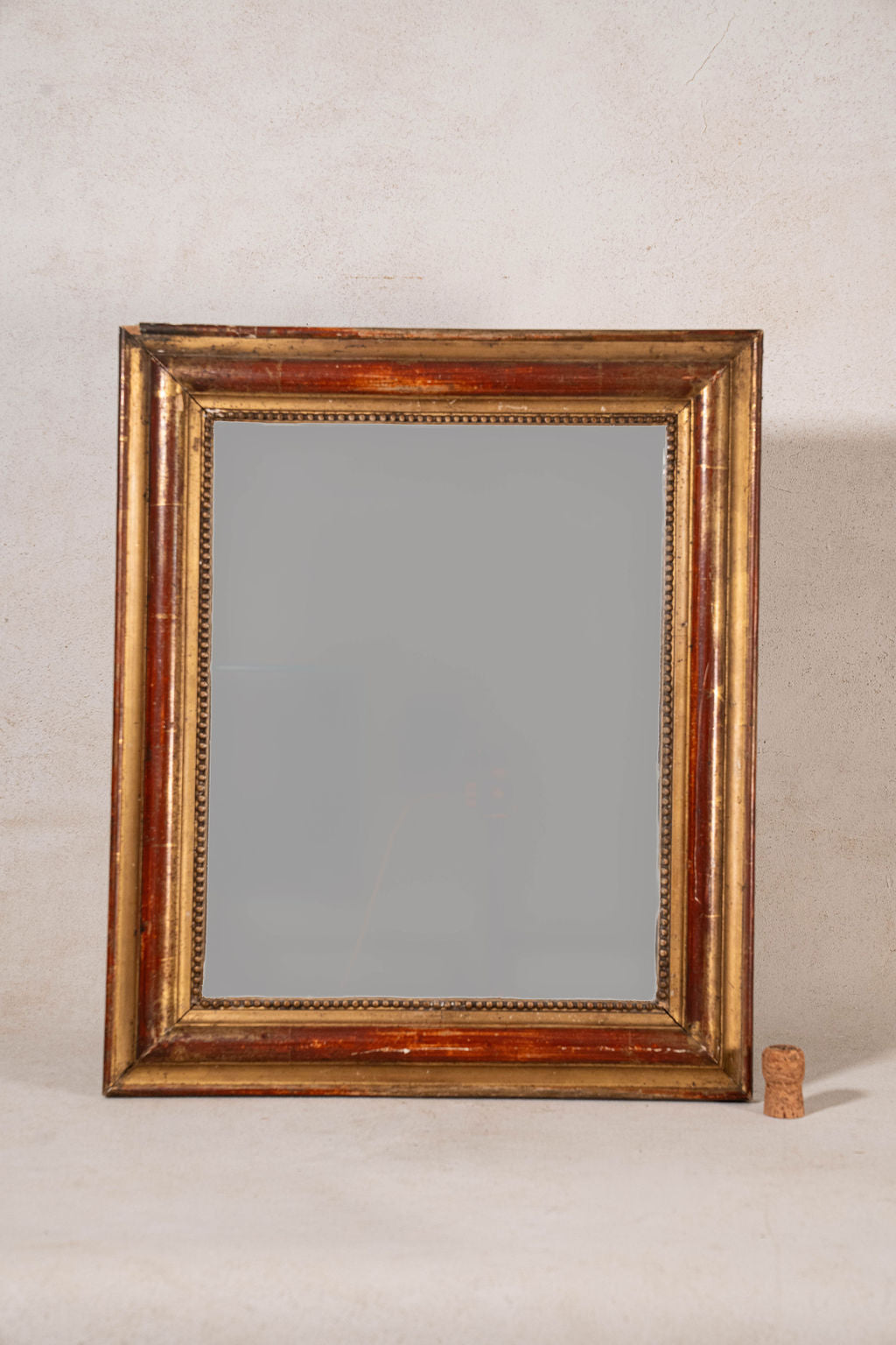 19th Century French Giltwood Mirror with Red Wash + Beaded Inner Detailing