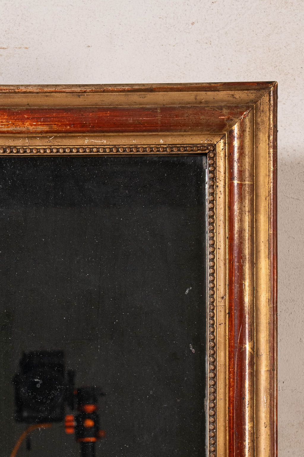19th Century French Giltwood Mirror with Red Wash + Beaded Inner Detailing