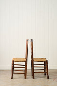 Load image into Gallery viewer, SET of 8 | 19th Century Ash Ladder Back Side Chairs with Rush Seats
