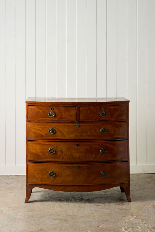 19th Century English Mahogany Two Over Three Bow Front Chest With Circle Pulls