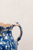 Load image into Gallery viewer, Antique Bulbous Dark Blue Glazed Scalloped Spongeware Pitcher
