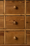 Load image into Gallery viewer, Antique English Pitch Pine 16-Drawer Apothecary Cabinet
