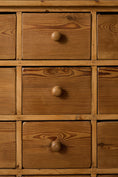 Load image into Gallery viewer, Antique English Pitch Pine 16-Drawer Apothecary Cabinet
