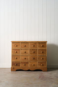 Load image into Gallery viewer, Antique English Pitch Pine 16-Drawer Apothecary Cabinet
