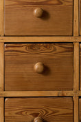 Load image into Gallery viewer, Antique English Pitch Pine 16-Drawer Apothecary Cabinet

