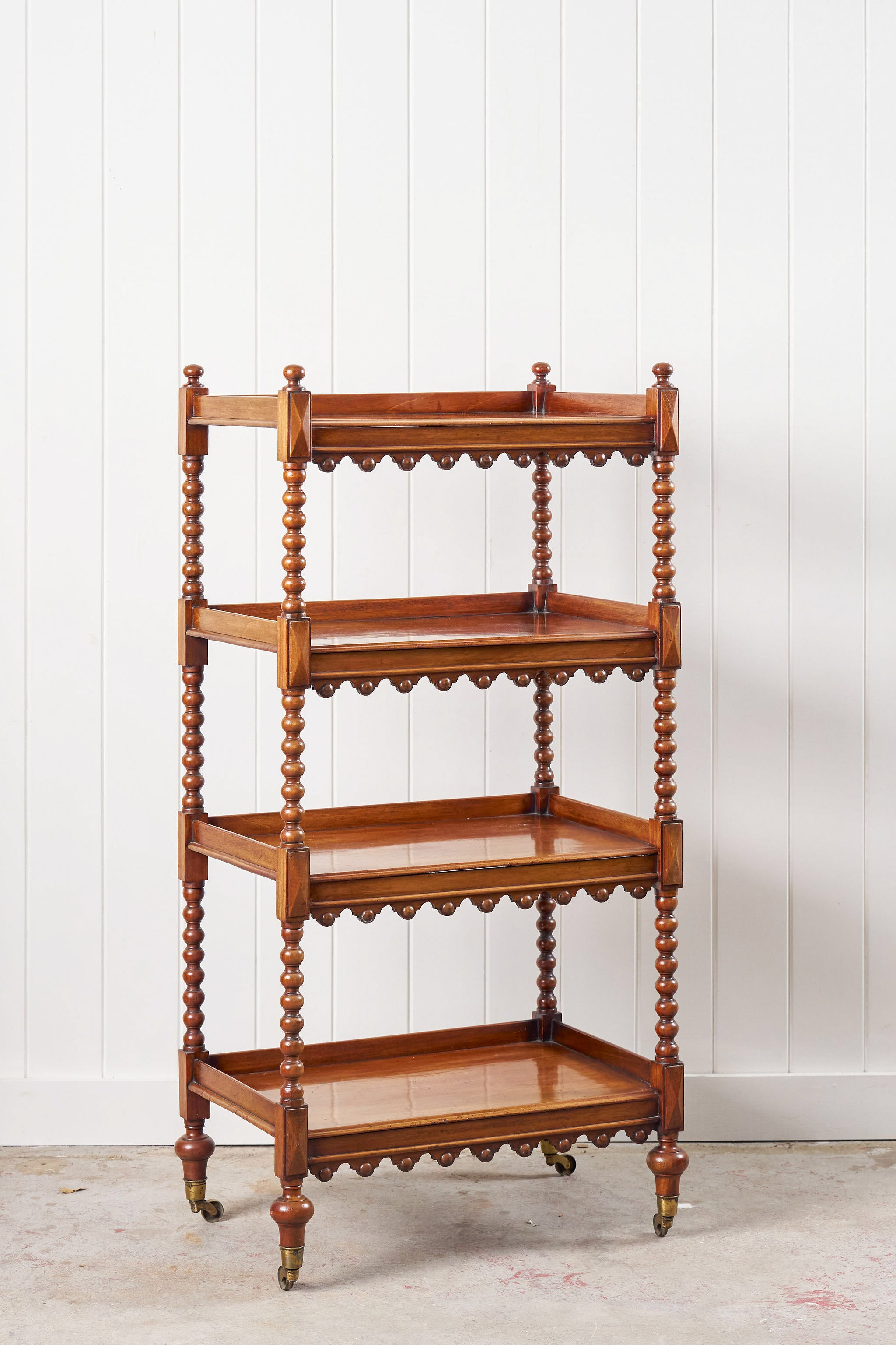 Victorian Four-Tier Whatnot with Bobbin Legs on Casters