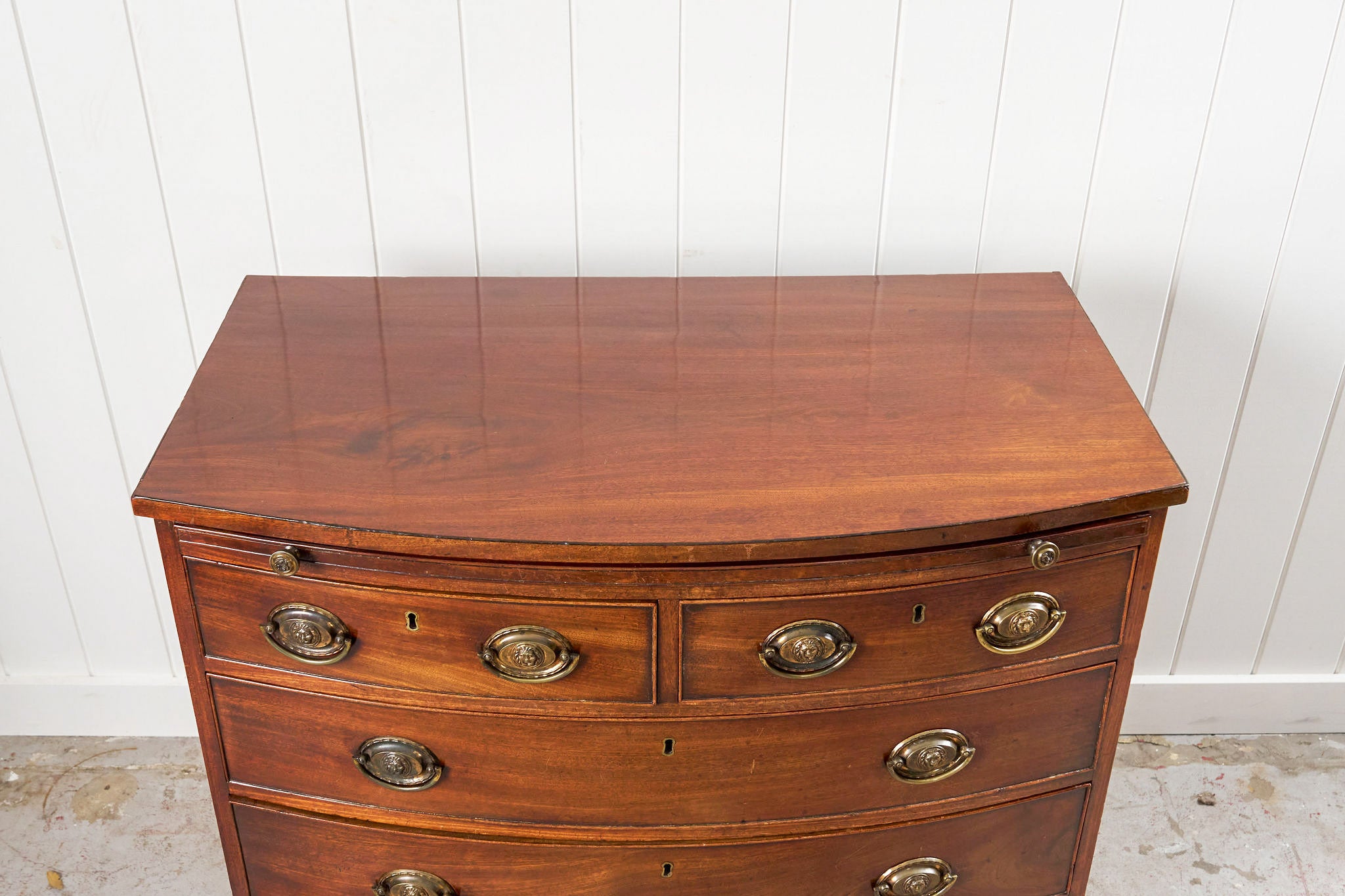 19th Century Georgian Mahogany Bowfront with Lionhead Pulls