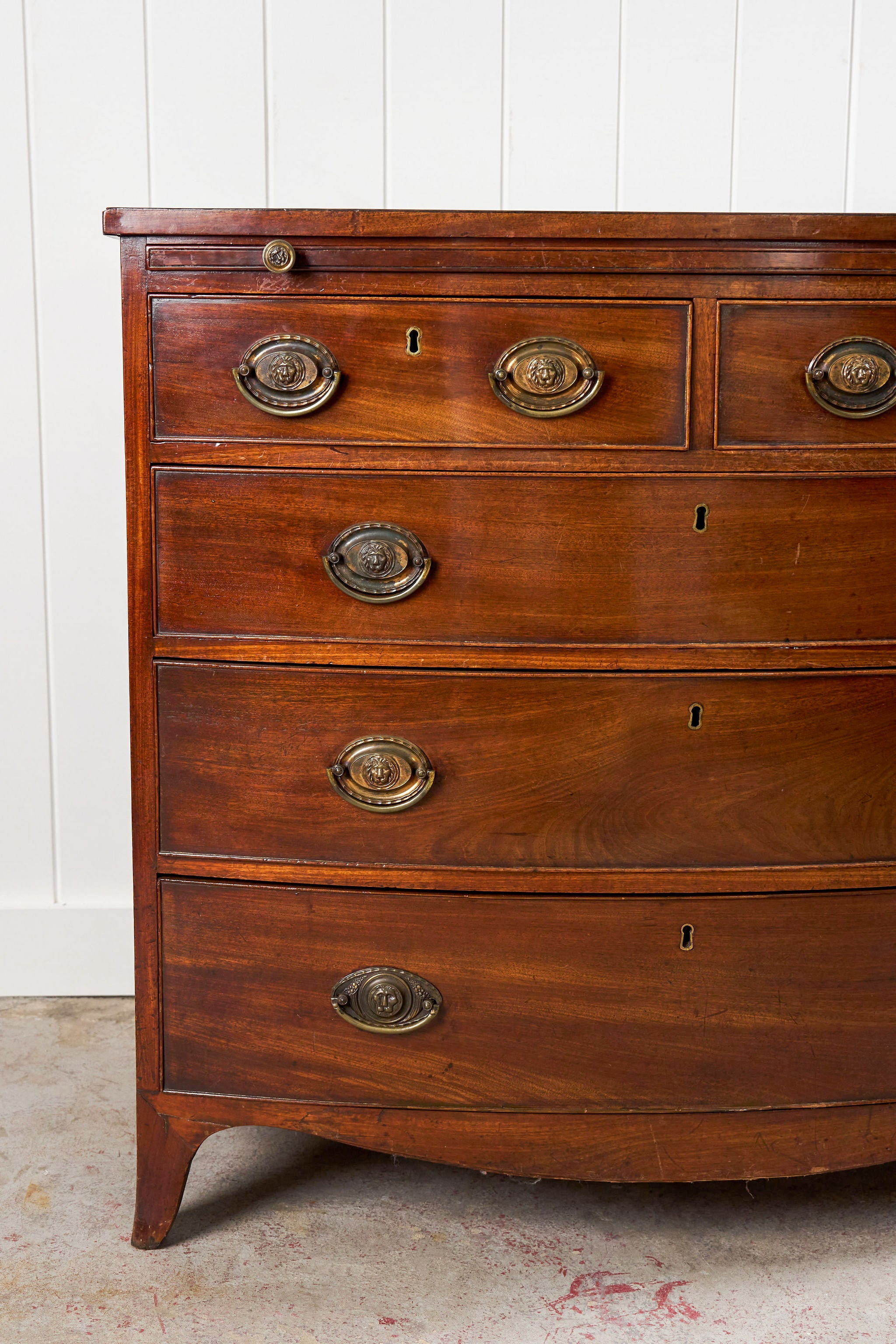 19th Century Georgian Mahogany Bowfront with Lionhead Pulls