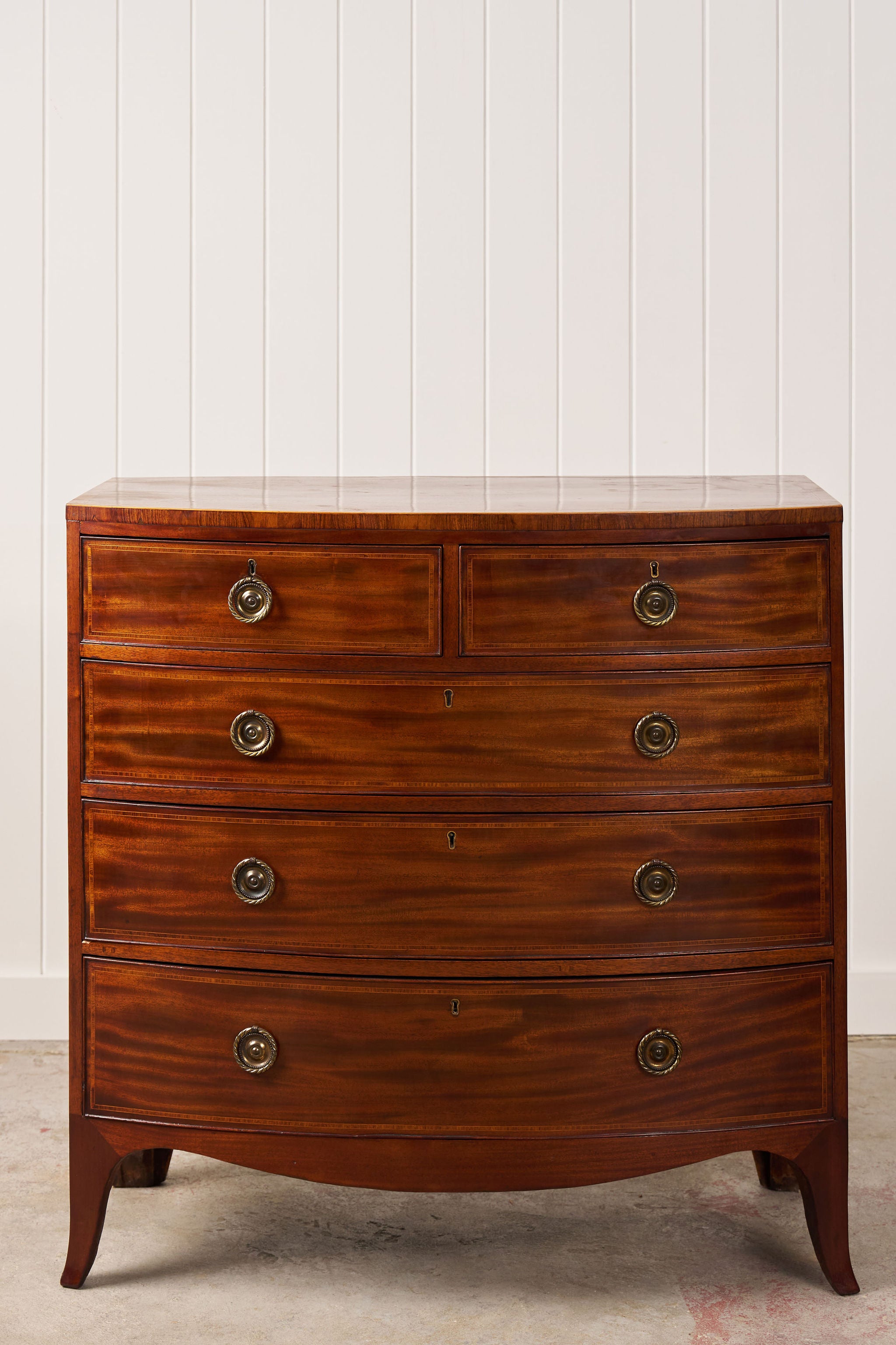 19th Century English Mahogany 2 Over 3 Bow Front Chest with Rope Detail Ring Pulls