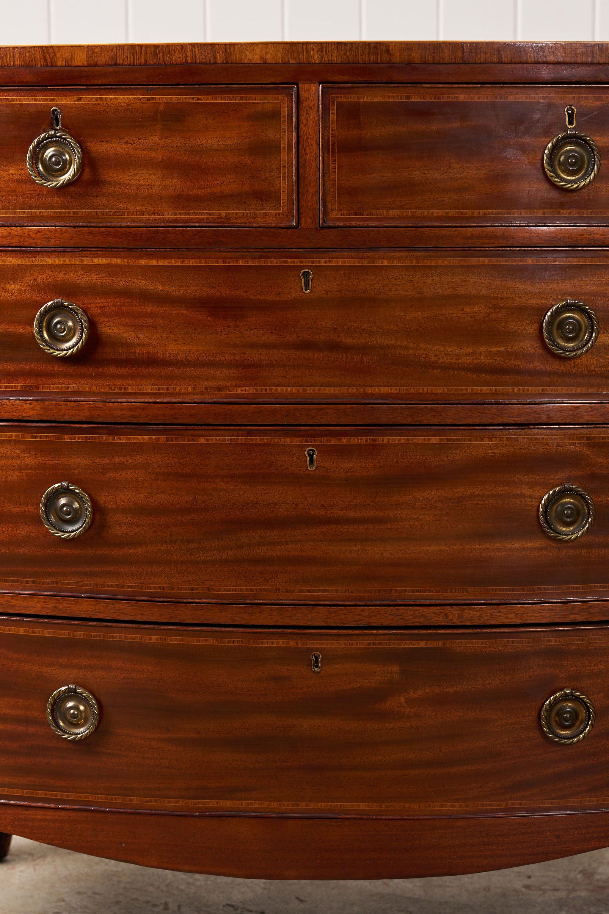 19th Century English Mahogany 2 Over 3 Bow Front Chest with Rope Detail Ring Pulls