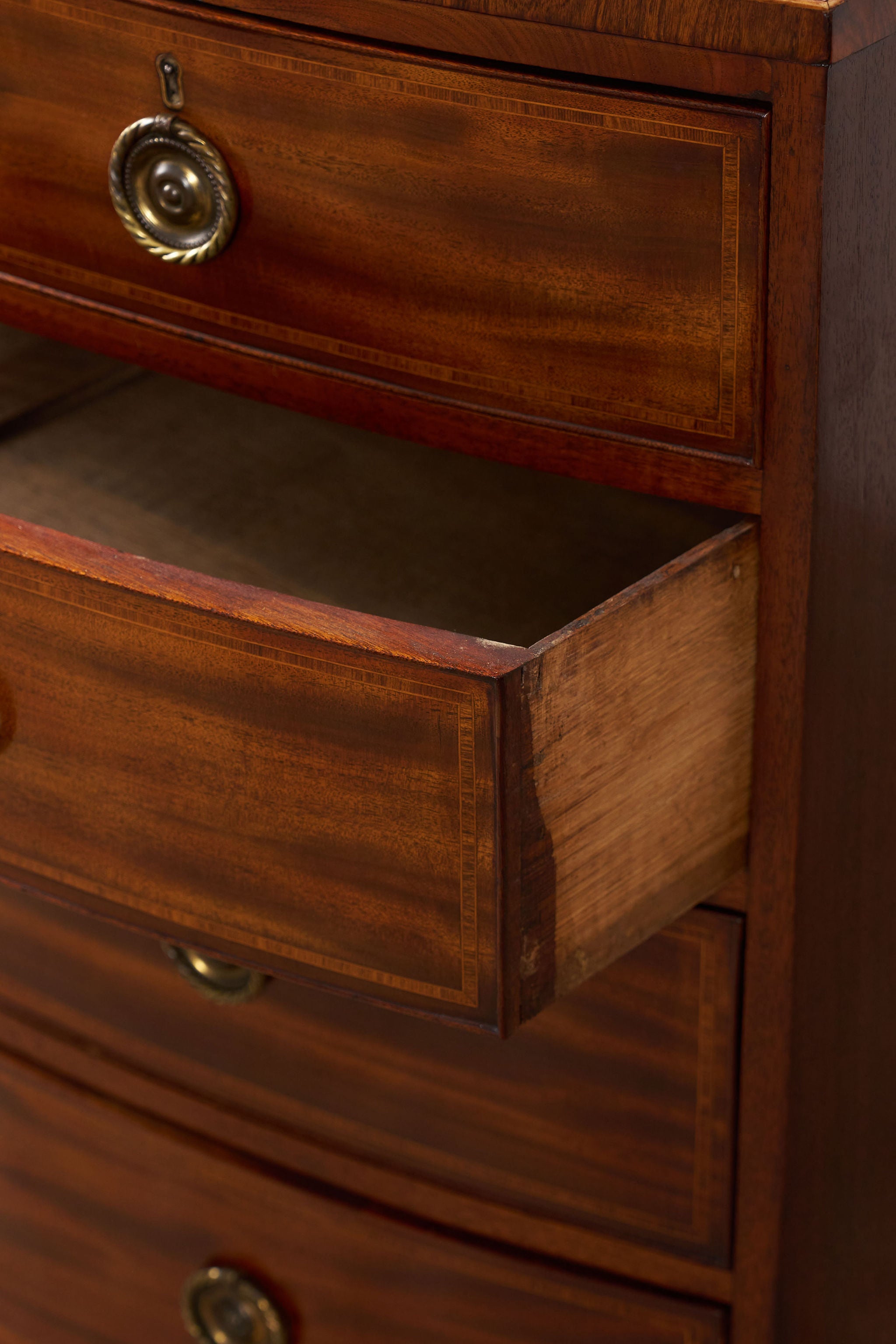 19th Century English Mahogany 2 Over 3 Bow Front Chest with Rope Detail Ring Pulls
