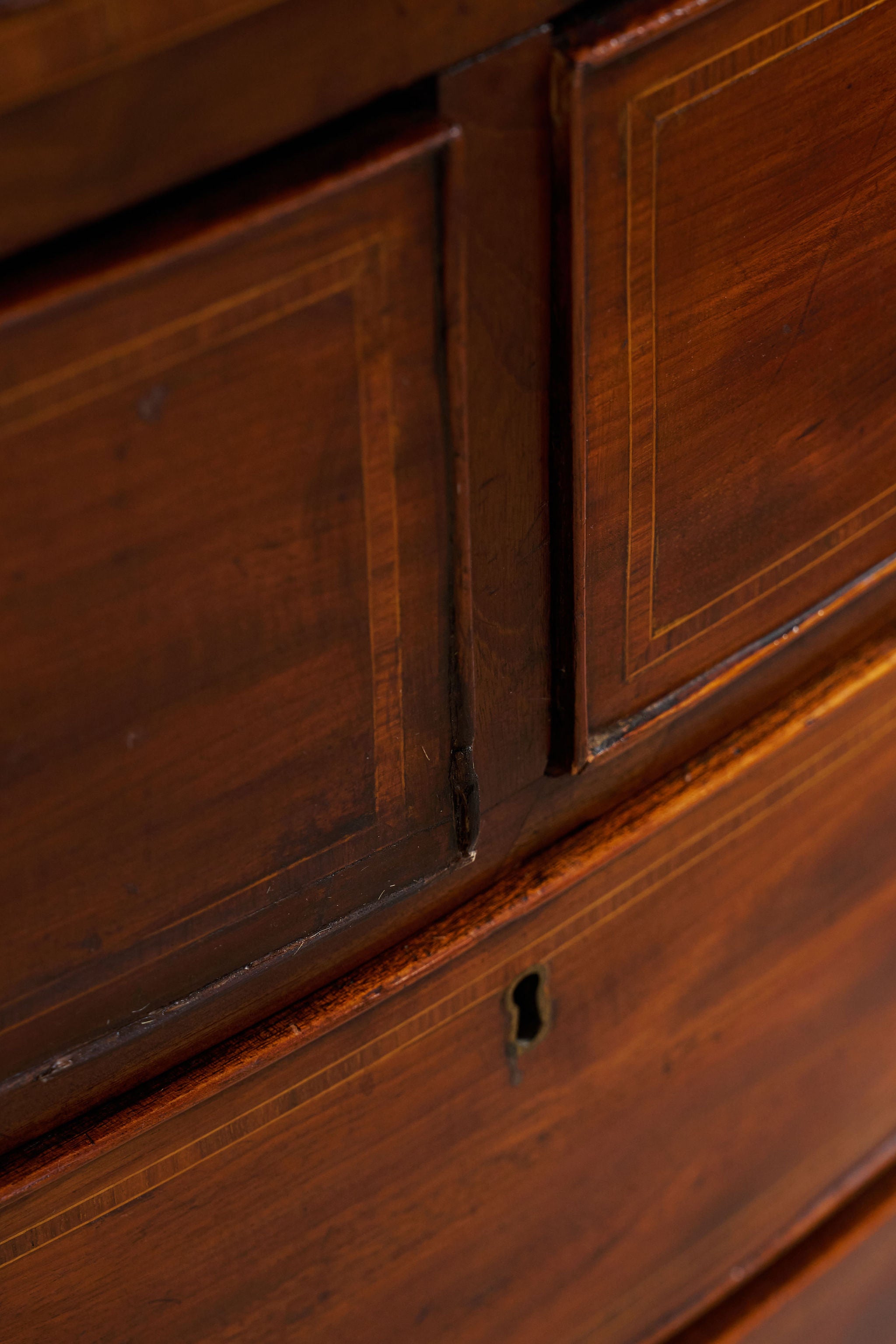 19th Century English Bowfront Chest with Urn Motif Oval Hardware