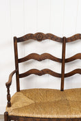 Load image into Gallery viewer, Vintage Oak Settee with Rush Seat + Floral Wood Carvings
