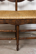 Load image into Gallery viewer, Vintage Oak Settee with Rush Seat + Floral Wood Carvings
