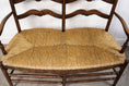 Load image into Gallery viewer, Vintage Oak Settee with Rush Seat + Floral Wood Carvings
