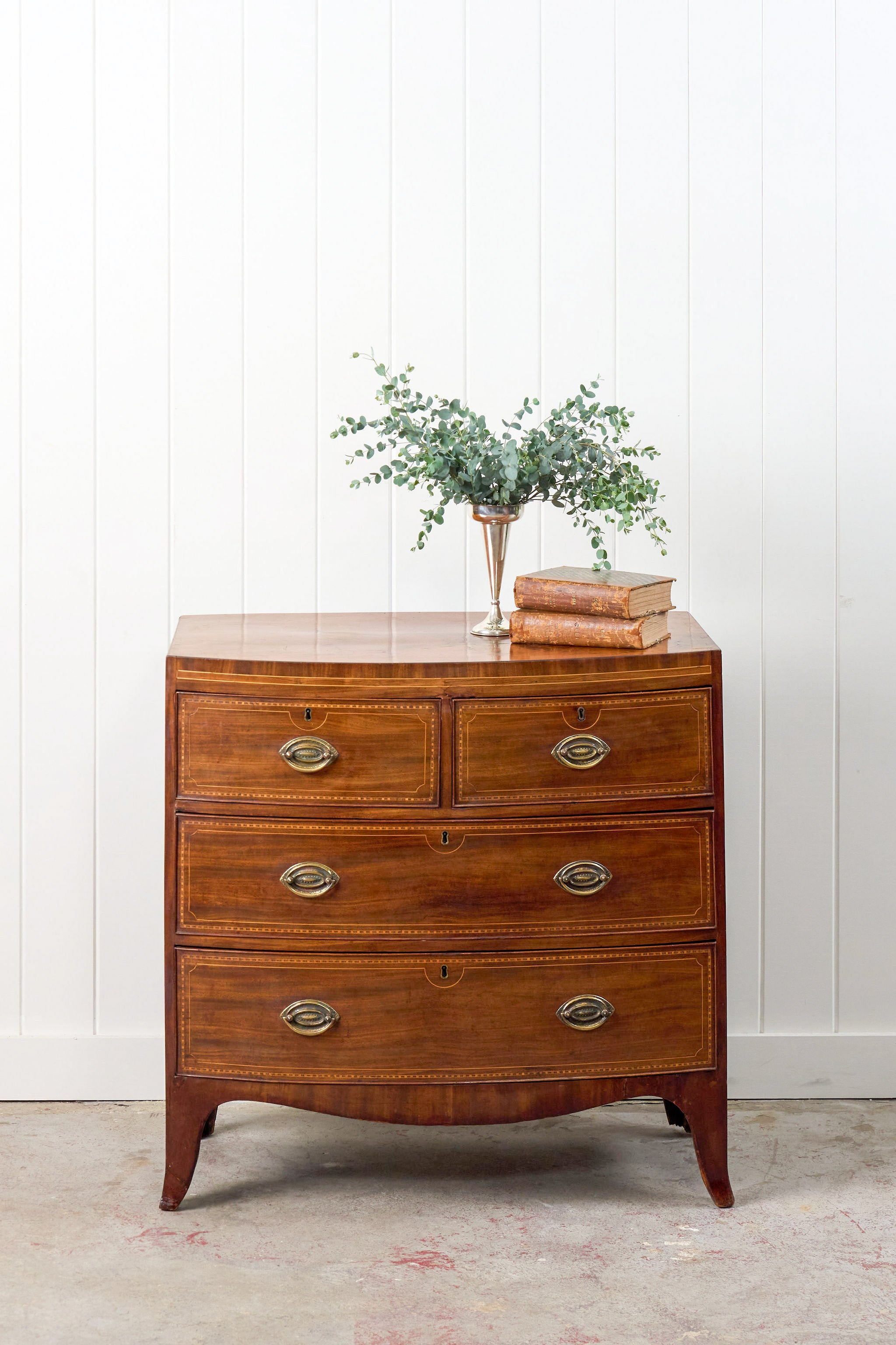 19th Century Mahogany Bowfront Chest with Satinwood Inlay on Splay Feet (c. 1810)